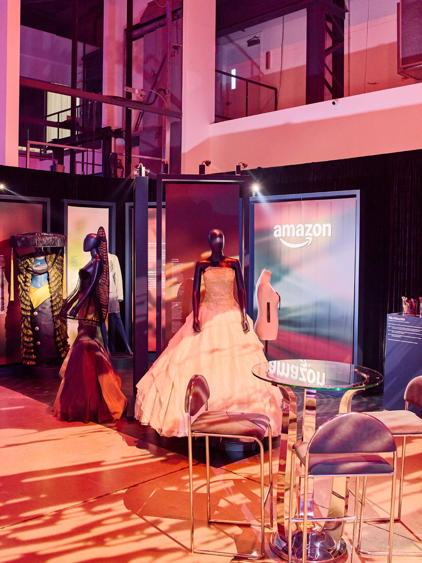 Couture gowns on display at a brand activation