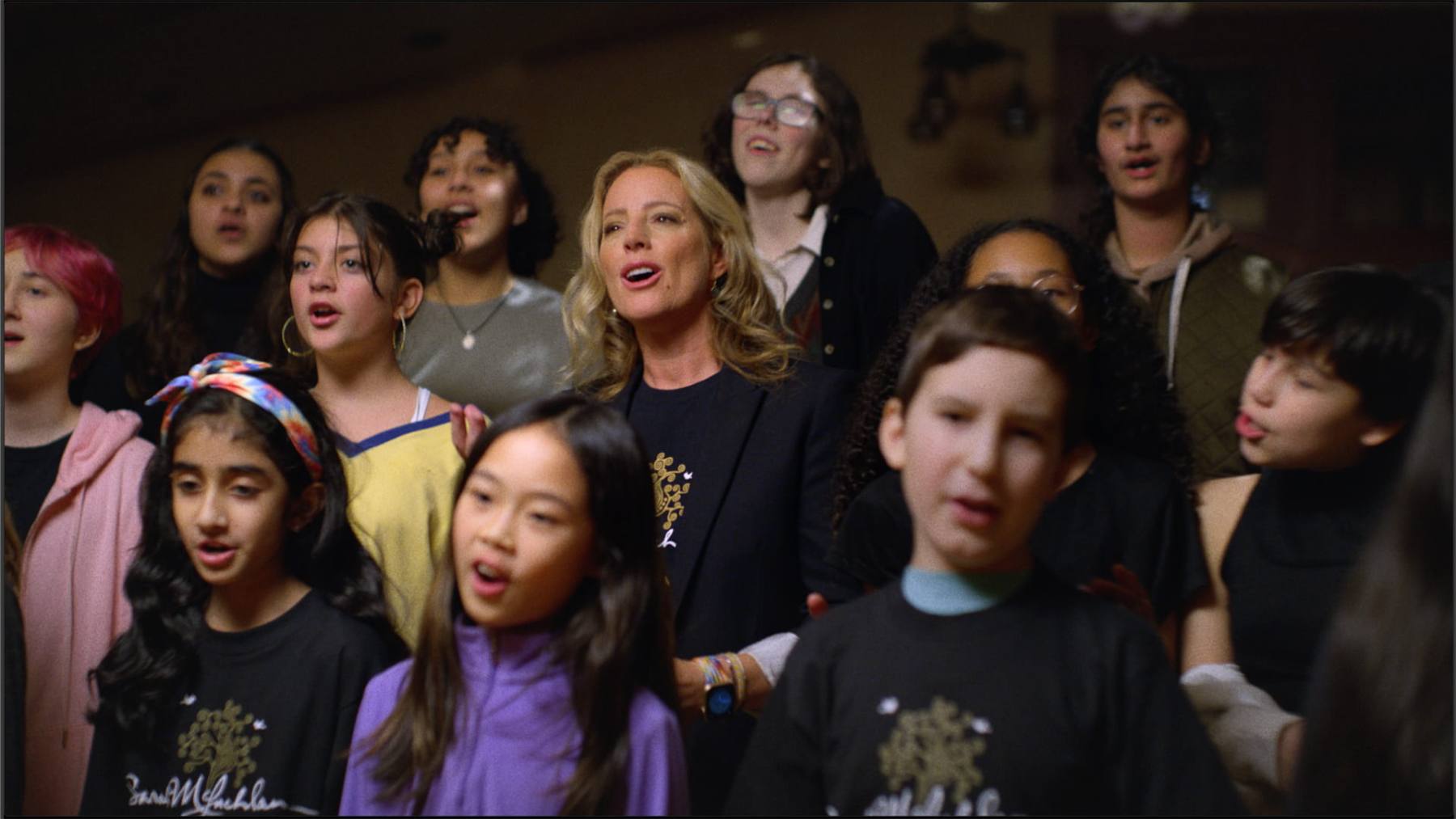 Young choir and artists singing together for Feel Out Loud