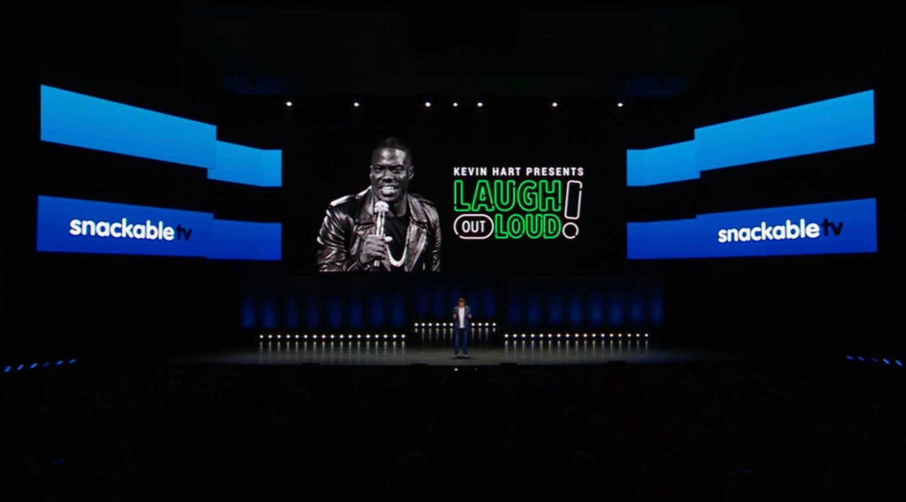 A keynote presentation on a large stage